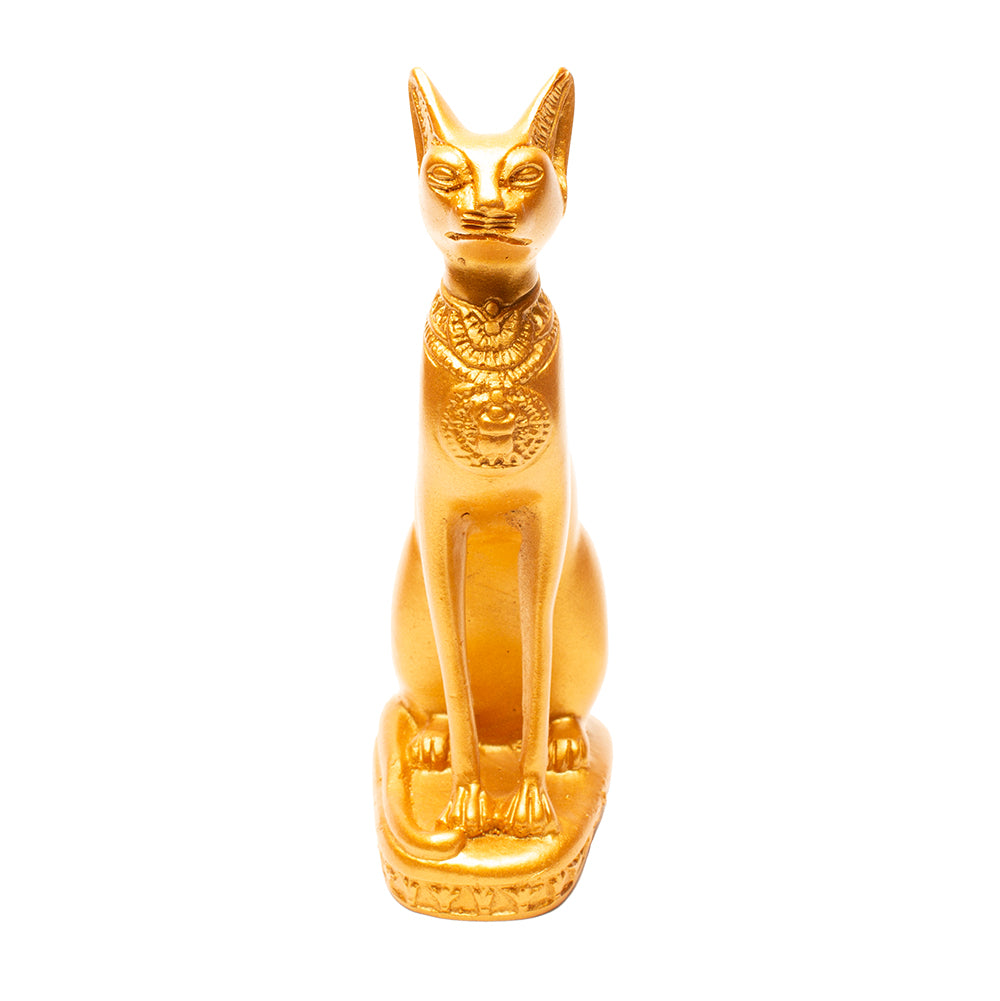 Gold Egyptian-style cat figurine on a white background