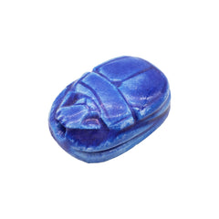 Blue stone scarab on a white background