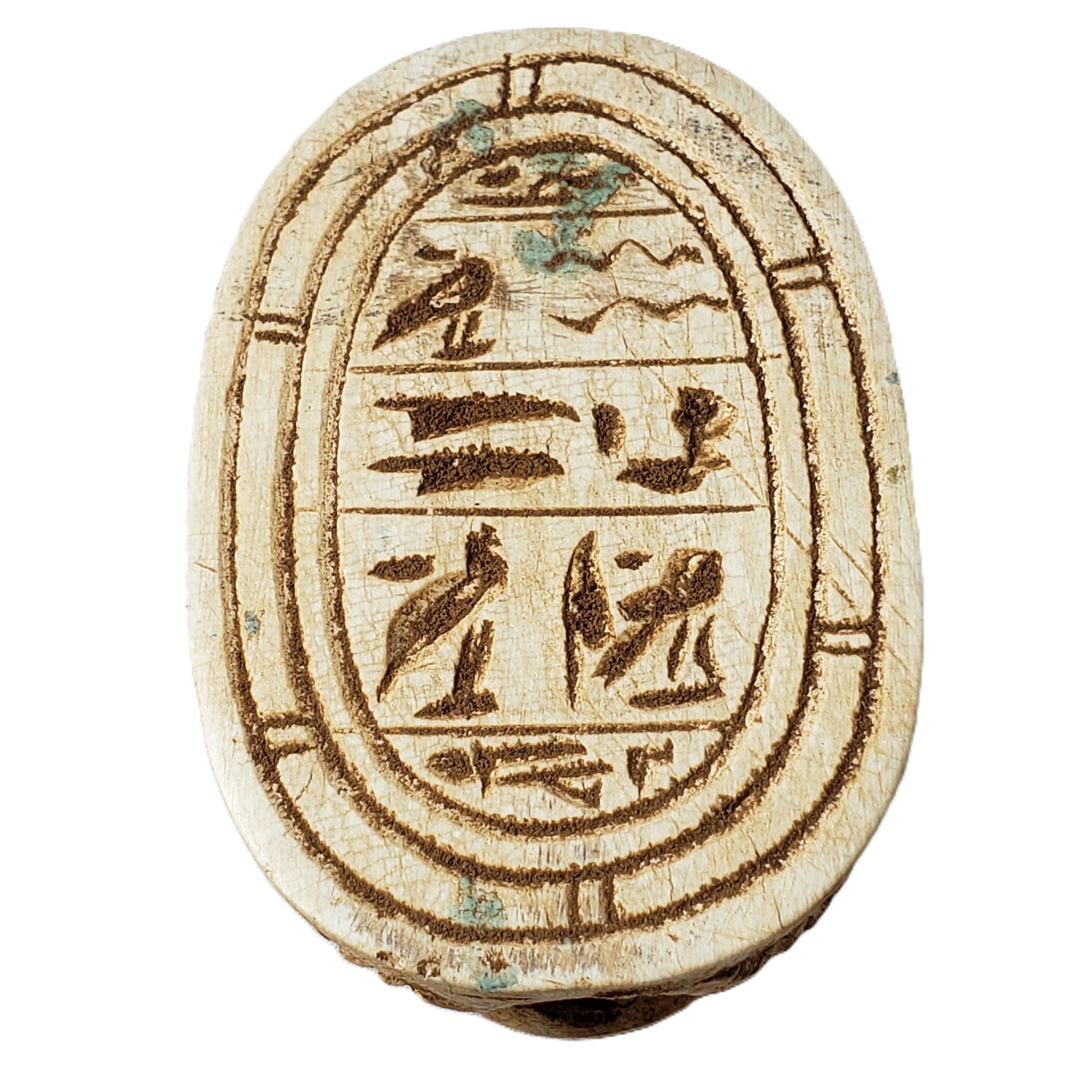Ancient Egyptian scarab with hieroglyphics on a white background