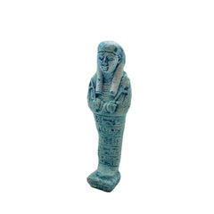 Blue Egyptian-style figurine on a white background