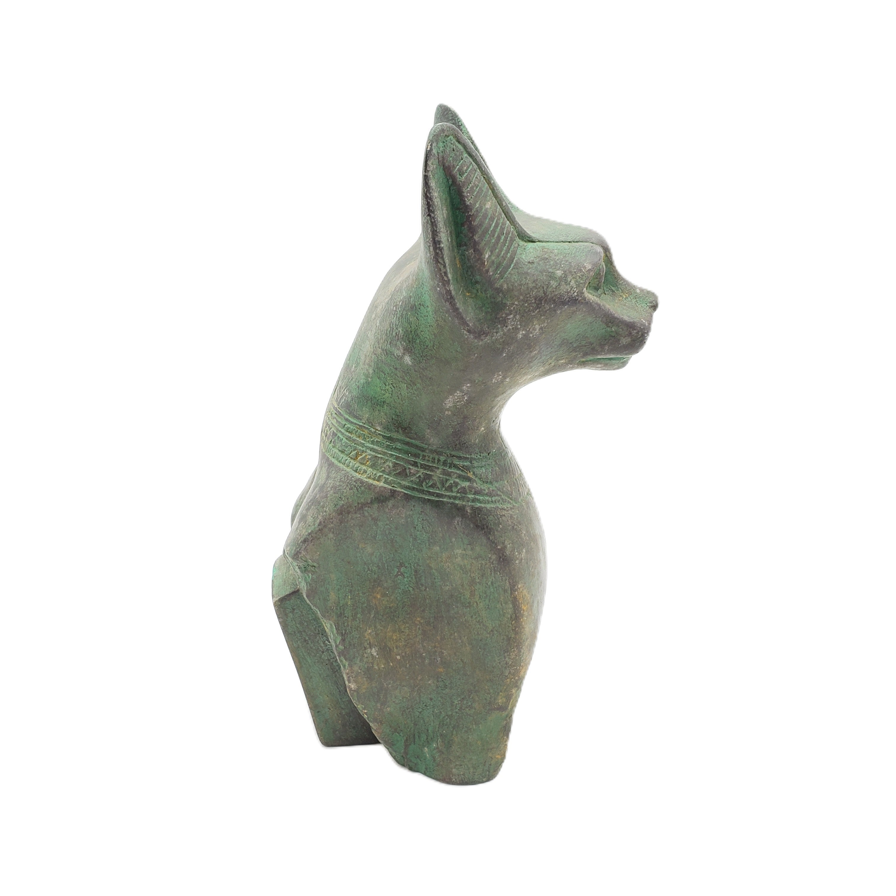 Greenish-brown statue of a cat on a white background