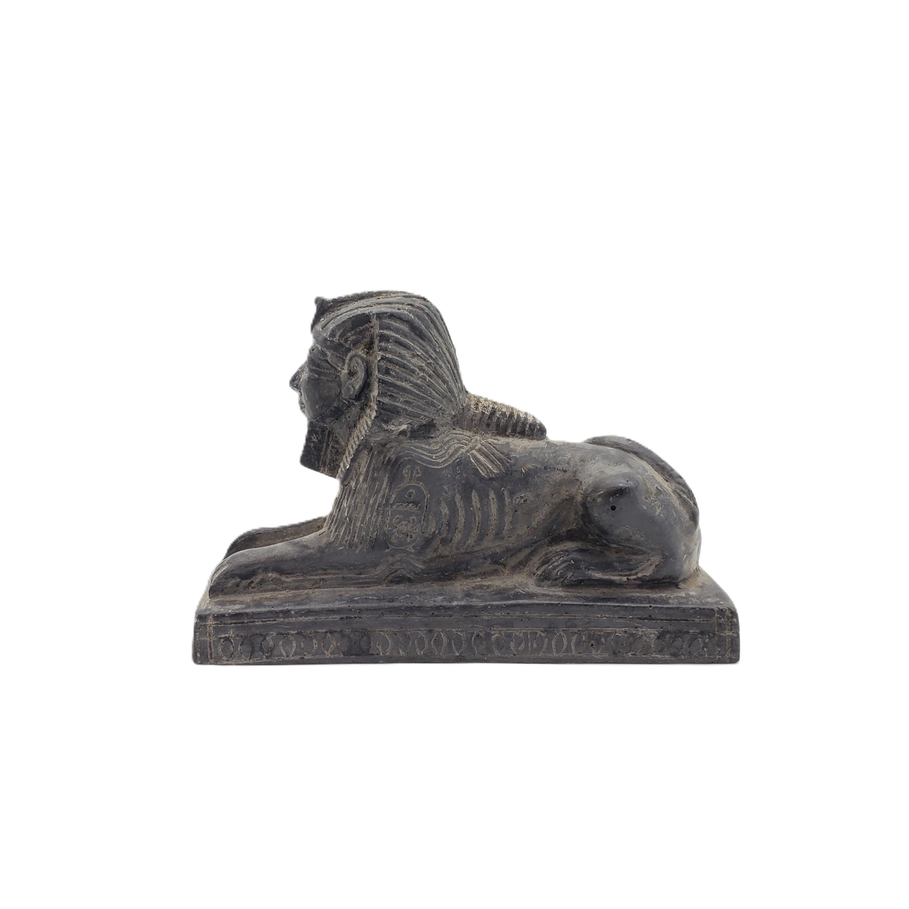 Statue of a sphinx on a white background