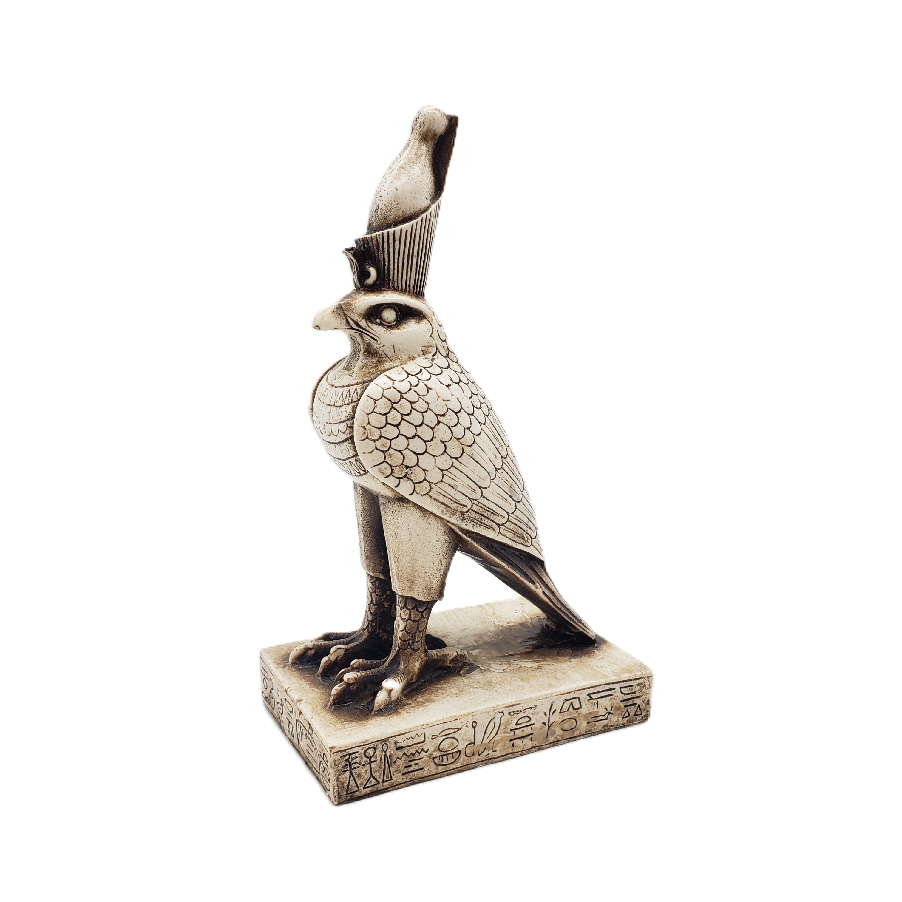 Statue of Egyptian falcon-god Horus with a headdress on a white background