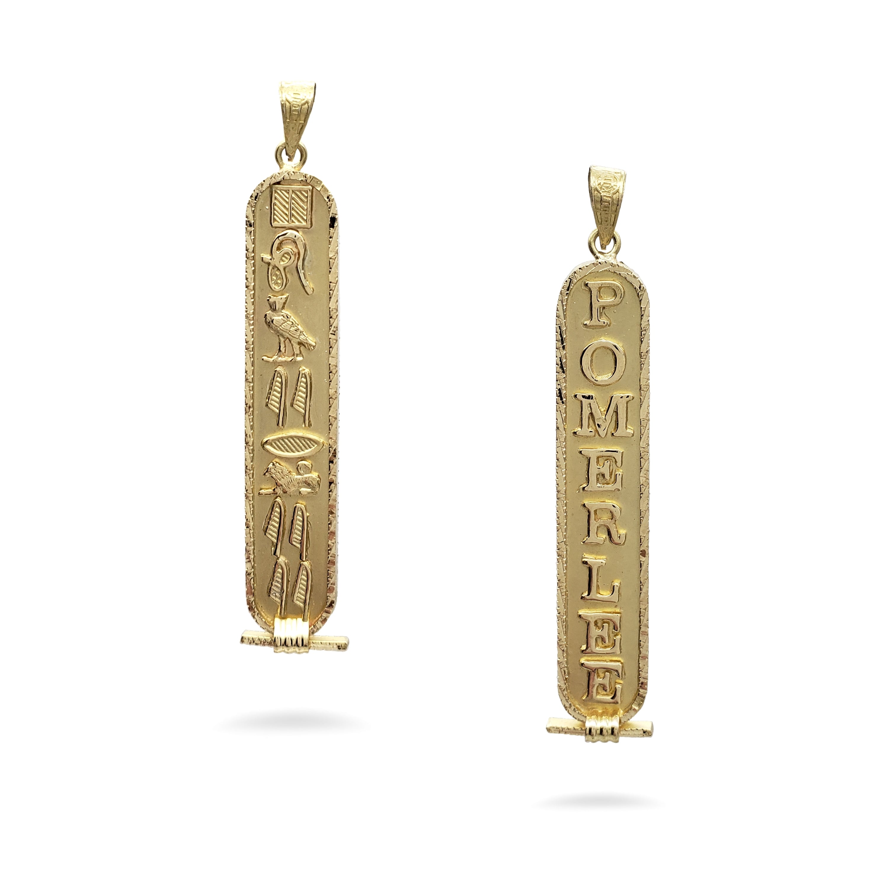 Two gold pendants with engraved designs on a white background