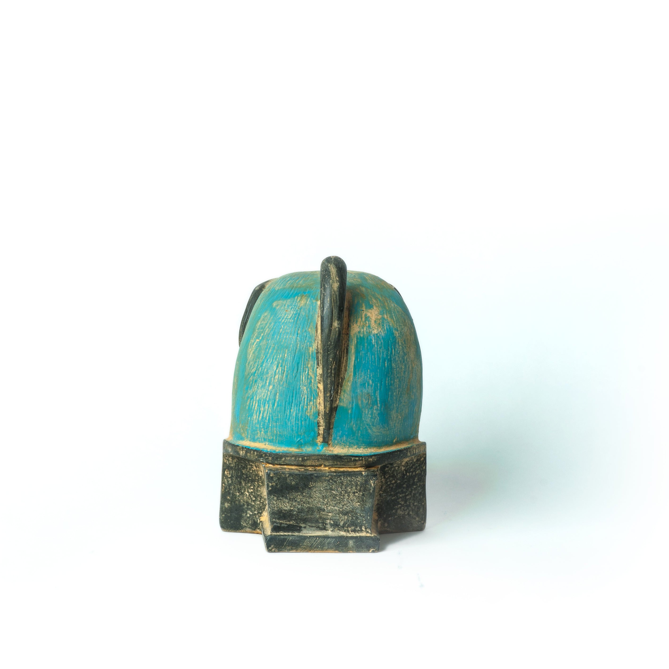 Decorative object with blue and gold colors on a white background