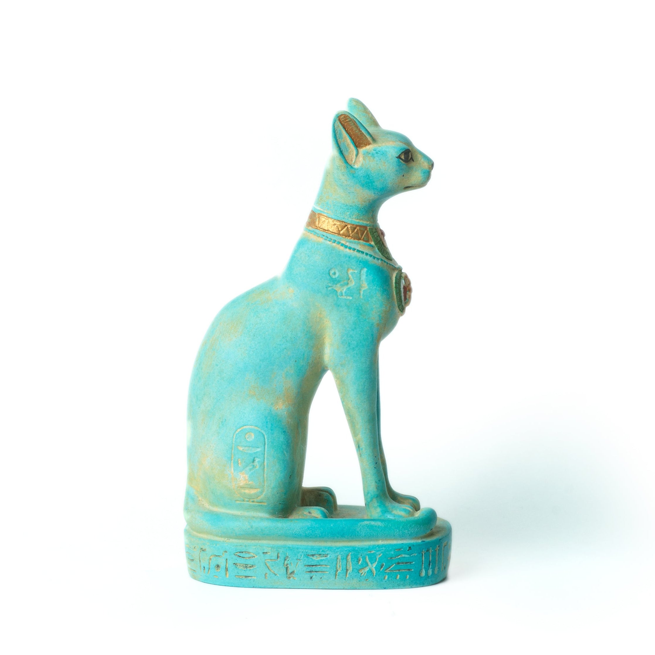Turquoise Egyptian-style cat figurine on a white background