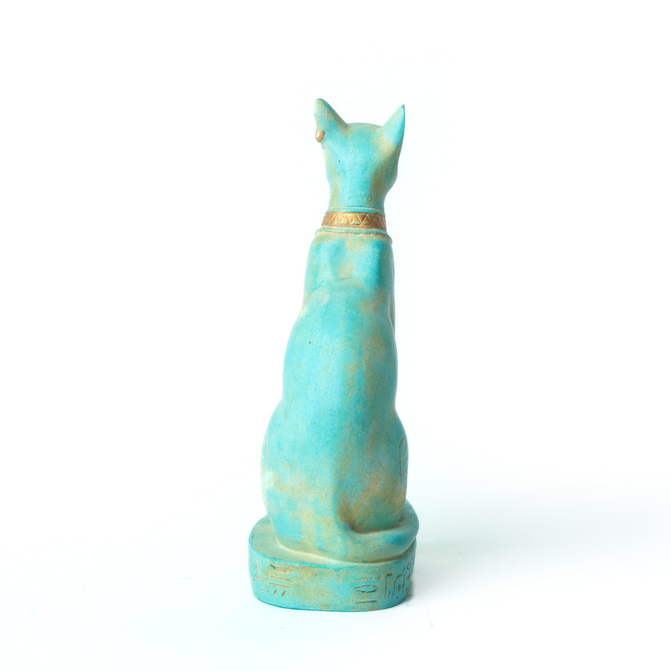 Turquoise ceramic cat figurine on a white background